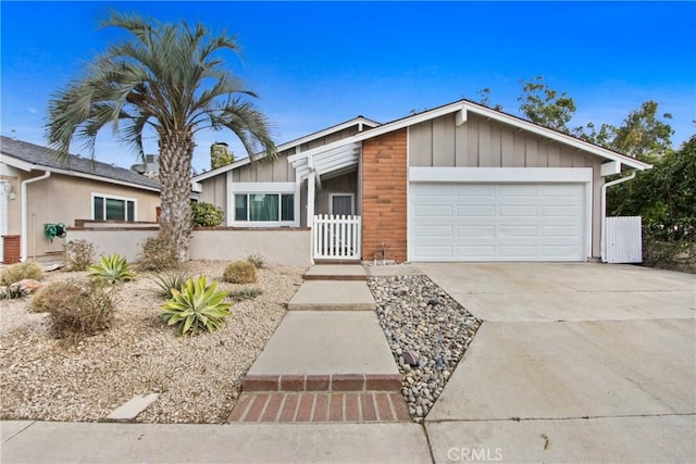 ranch-style house featuring a garage