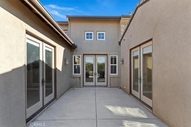 view of patio featuring french doors