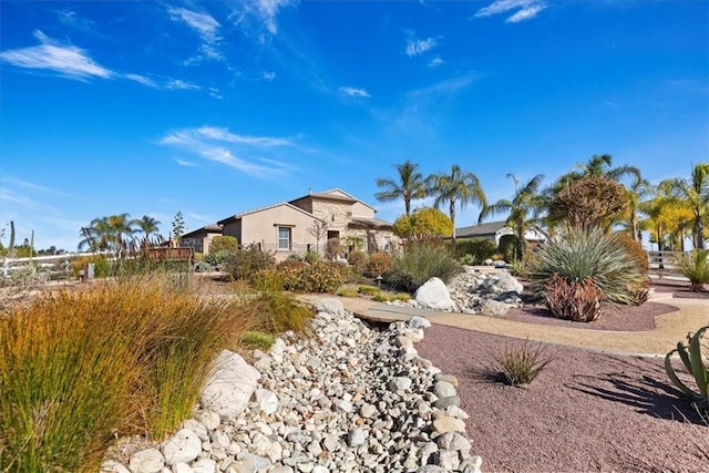 exterior space featuring stucco siding