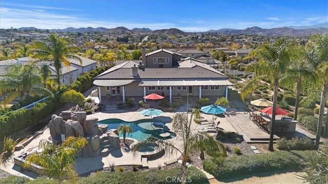 exterior space featuring a mountain view