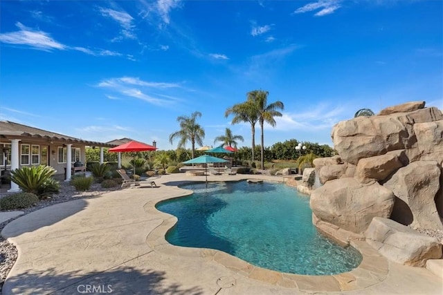 outdoor pool featuring a patio area