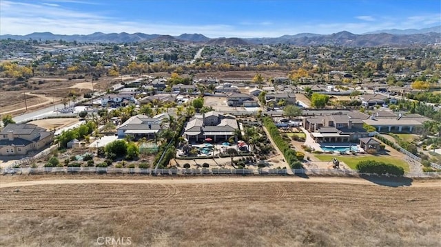 bird's eye view with a mountain view and a residential view