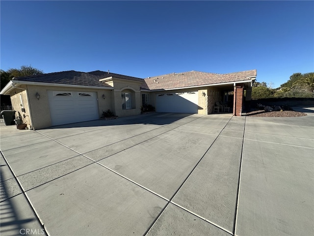 single story home with a garage