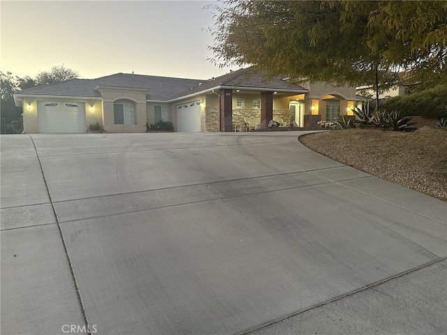 view of front of property with a garage