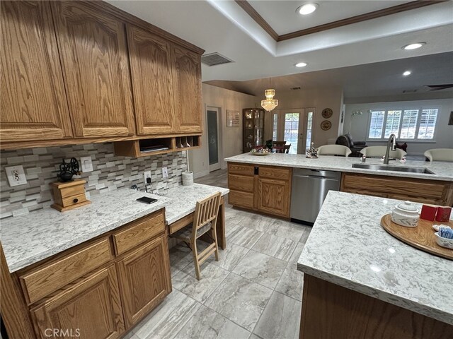 kitchen featuring an inviting chandelier, crown molding, sink, stainless steel dishwasher, and tasteful backsplash