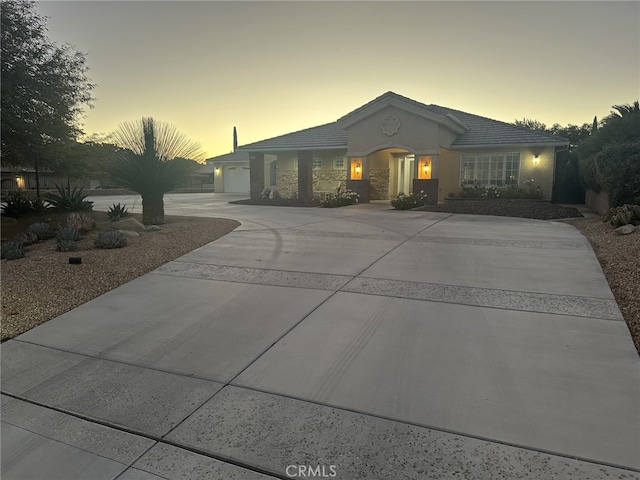 view of front of property with a garage