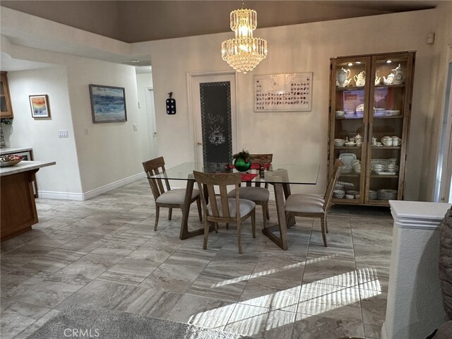 dining area featuring a chandelier