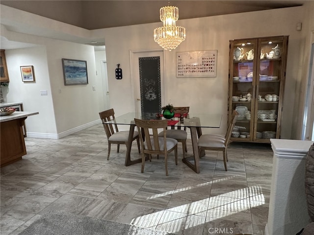 dining room with a chandelier