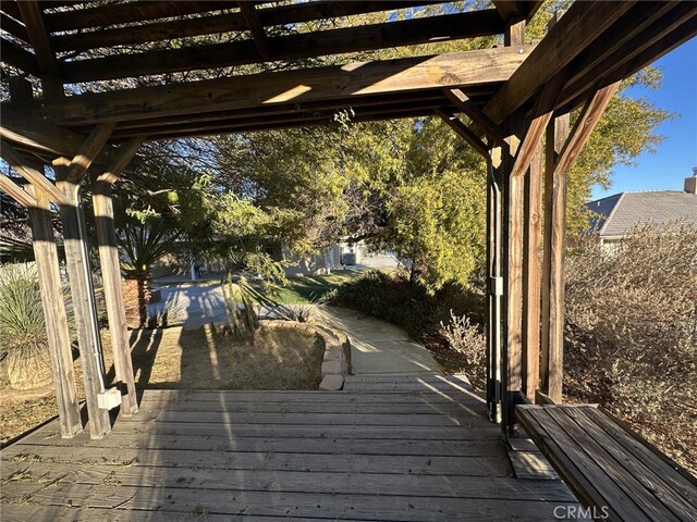 wooden deck with a pergola