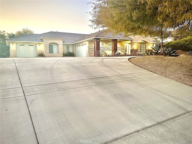 view of front of property with a garage