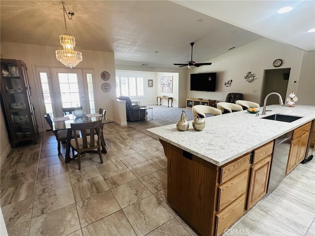16232 Ridge View Dr, Apple Valley, CA 92307 - kitchen with a sink, open floor plan, pendant lighting, a chandelier, and a ceiling fan