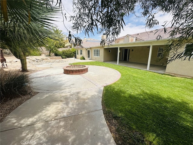 16232 Ridge View Dr, Apple Valley, CA 92307 - view of grassy yard with a patio area