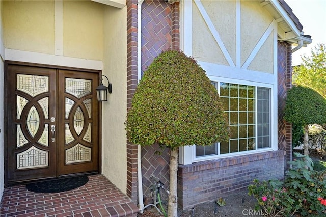 doorway to property featuring french doors