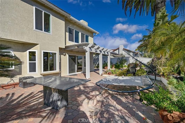 view of patio featuring a pergola