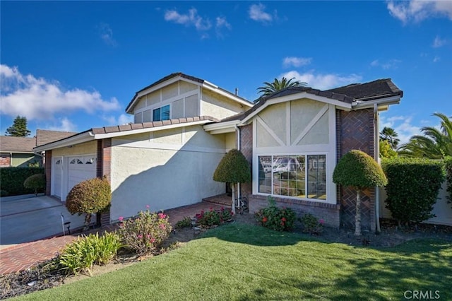 view of front of property with a garage and a front lawn