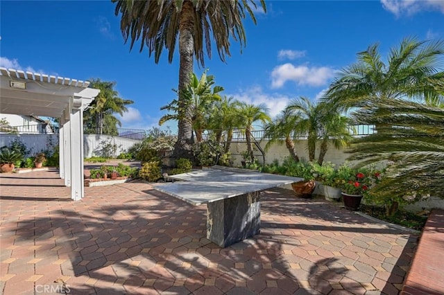 view of patio featuring a pergola