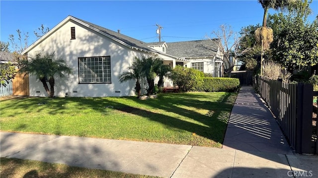 view of front of home with a front yard