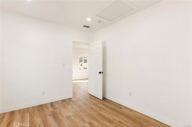 unfurnished room featuring light hardwood / wood-style floors