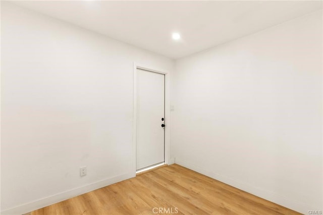 empty room featuring hardwood / wood-style floors