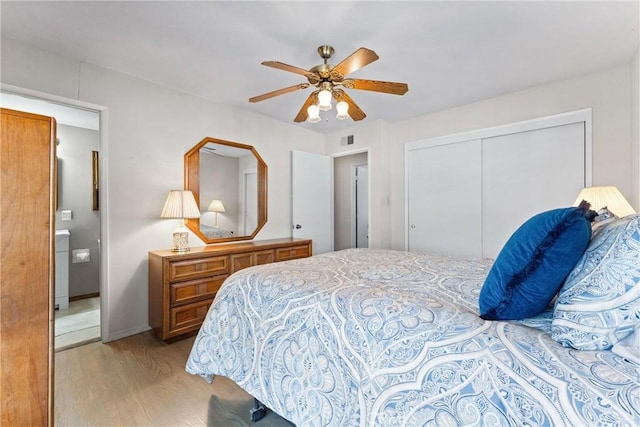 bedroom with a closet, ceiling fan, and light hardwood / wood-style flooring