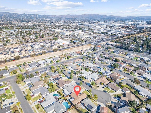 drone / aerial view featuring a mountain view