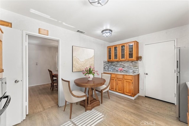 dining area featuring light hardwood / wood-style flooring