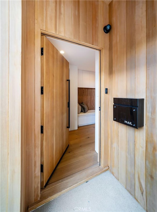 hallway with wooden walls