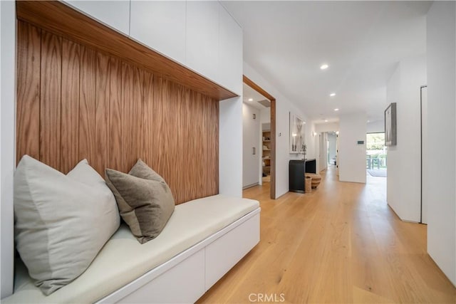 corridor featuring light hardwood / wood-style flooring