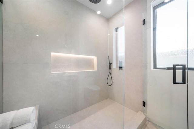 bathroom with walk in shower