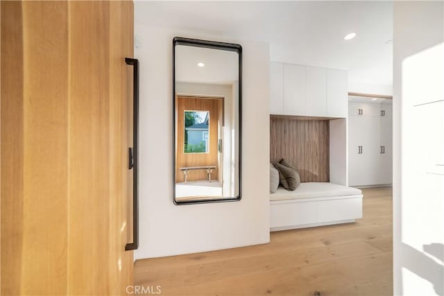 hallway featuring light wood-type flooring