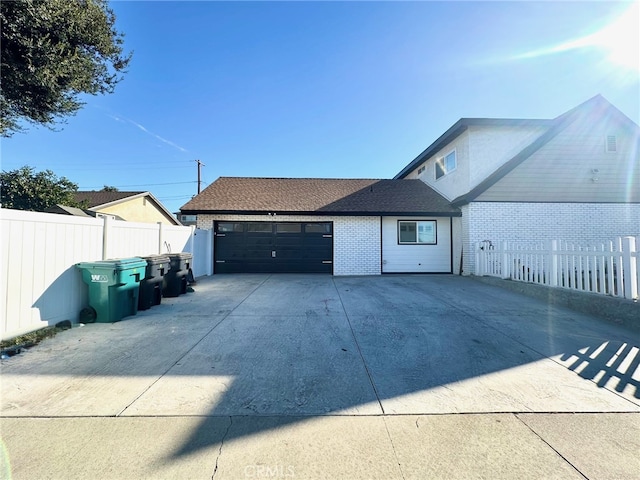 exterior space with a garage