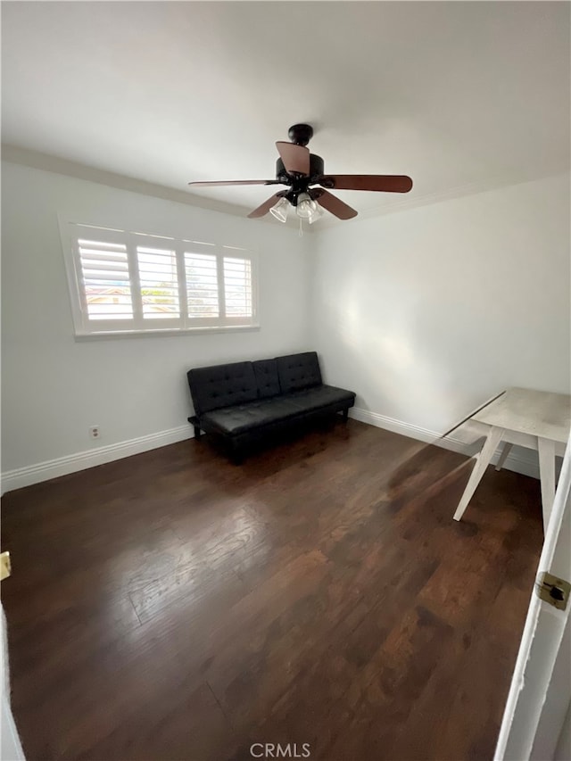 unfurnished room with ceiling fan and dark hardwood / wood-style floors