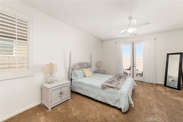 bedroom featuring french doors, carpet floors, access to outside, and ceiling fan