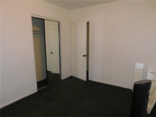 unfurnished bedroom with a closet