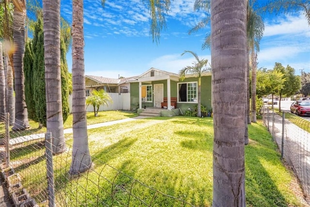 view of front of home with a front lawn