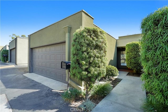 exterior space featuring a garage