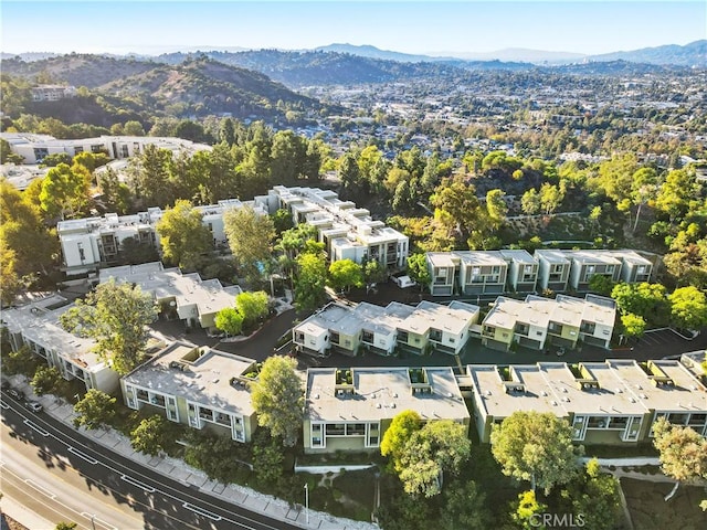 birds eye view of property with a mountain view