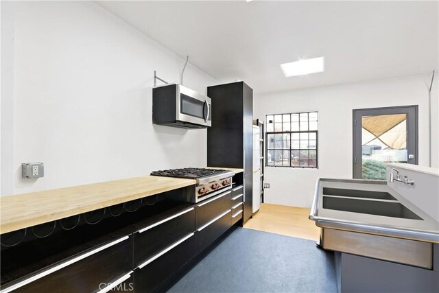 kitchen featuring appliances with stainless steel finishes and sink