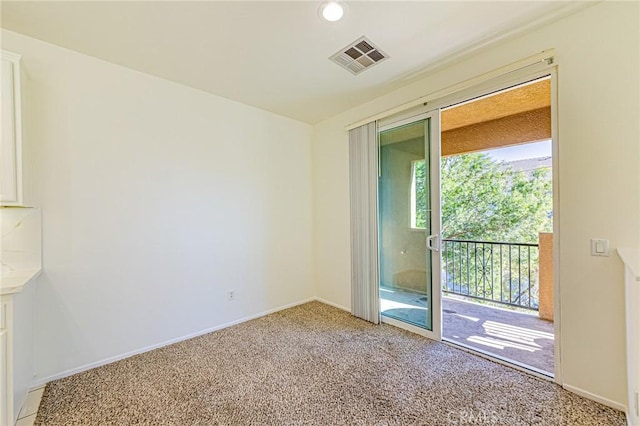 view of carpeted spare room