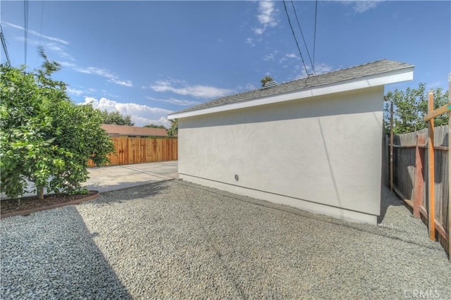 15570 Ethel St, Chino Hills, CA 91709 - view of side of property featuring stucco siding, a fenced backyard, and a patio