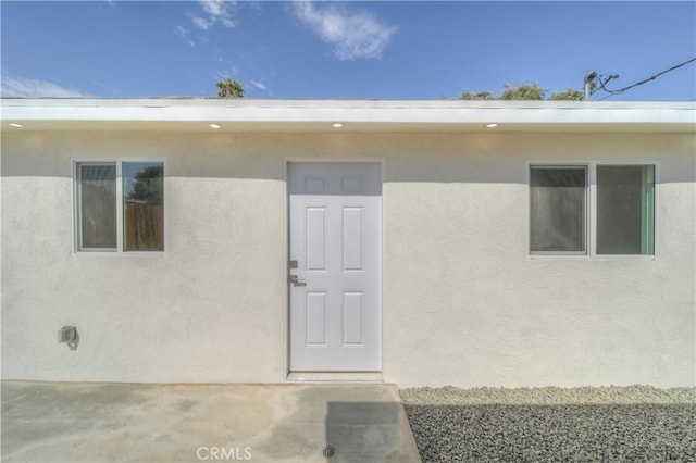 15570 Ethel St, Chino Hills, CA 91709 - doorway to property with a patio area and stucco siding