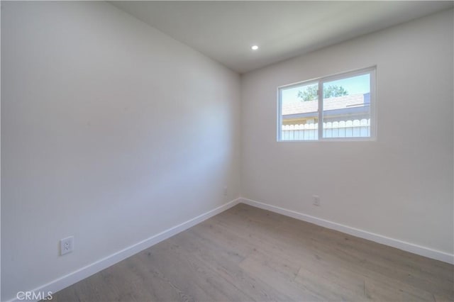15570 Ethel St, Chino Hills, CA 91709 - spare room featuring baseboards, wood finished floors, and recessed lighting