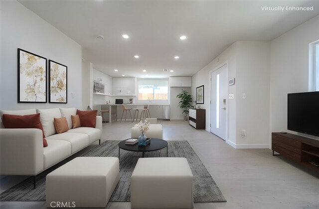 15570 Ethel St, Chino Hills, CA 91709 - living room featuring recessed lighting, light wood-style flooring, and baseboards