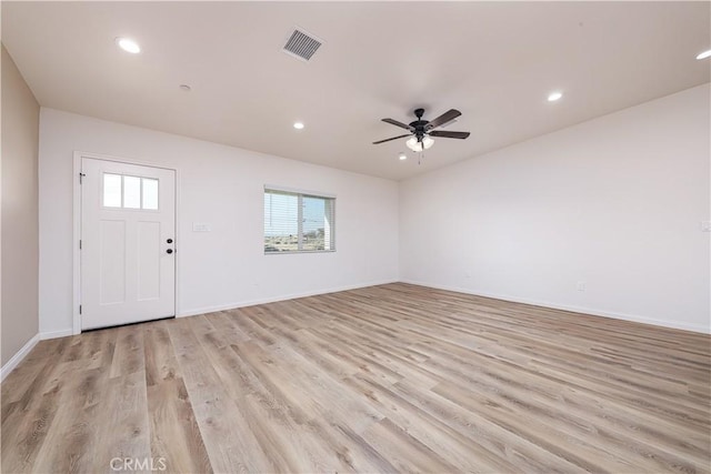 entryway featuring ceiling fan and light hardwood / wood-style floors