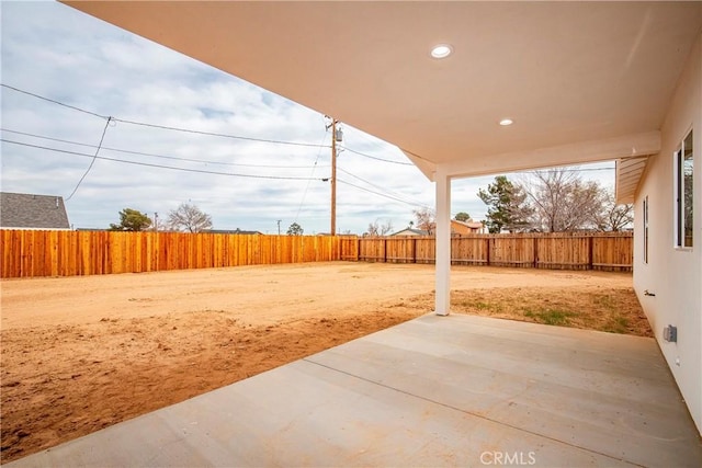 view of yard featuring a fenced backyard and a patio