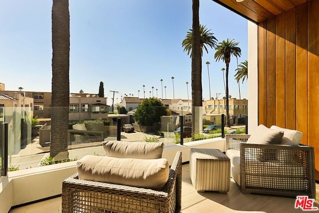 view of patio / terrace with a balcony