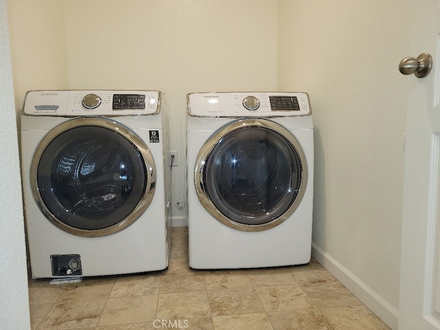 laundry area featuring independent washer and dryer