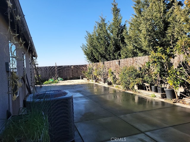 view of pool featuring central AC and a patio area