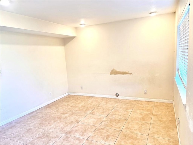 interior space featuring light tile patterned floors