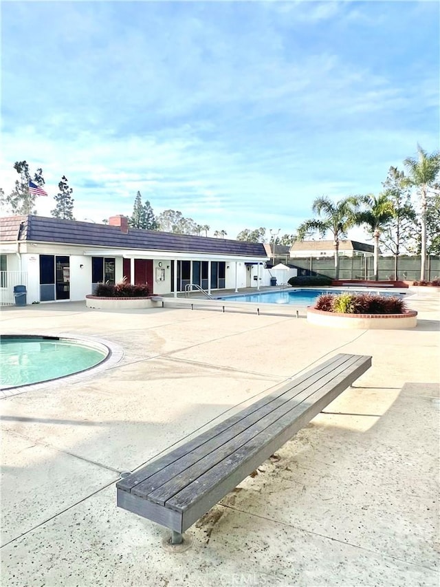 view of pool featuring a patio